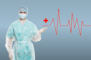 Image showing Portrait of an surgeon against medical background with ecg line