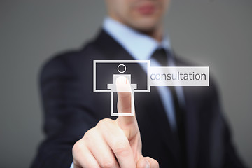 Image showing business, technology, internet and networking concept - businessman pressing consultation button on virtual screens