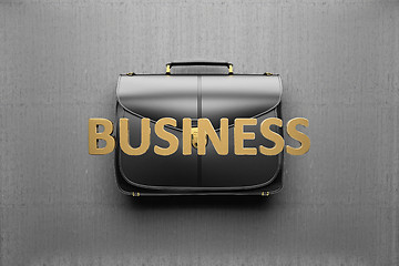 Image showing Briefcase on the background of gray concrete wall. Business conc