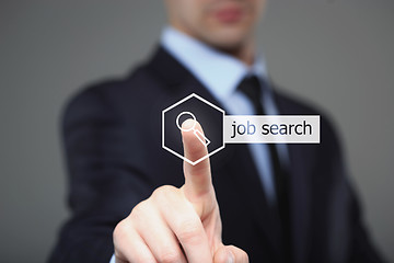 Image showing Businessman hand touching JOB SEARCH button on virtual screen