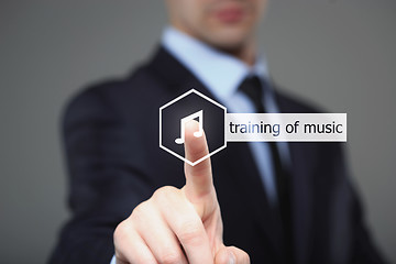 Image showing businessman pressing training Music button on virtual screens