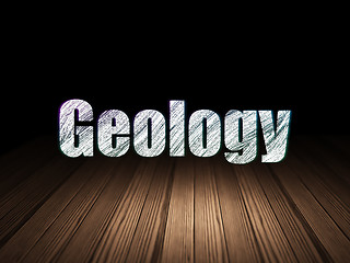 Image showing Studying concept: Geology in grunge dark room