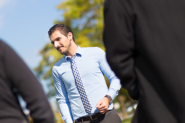 Image showing Informal out of office outdoors business meeting.