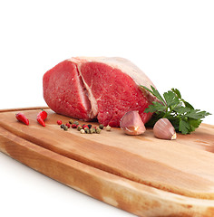 Image showing raw meat on wood board