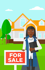 Image showing Real estate agent offering house.