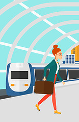 Image showing Woman going out of train.