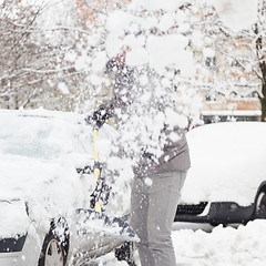 Image showing Man shoveling snow in winter.