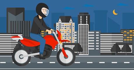 Image showing Man riding motorcycle.