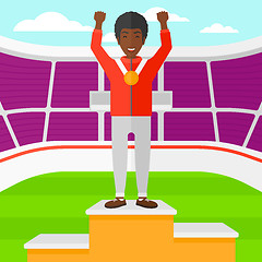 Image showing Athlete with medal and hands raised.