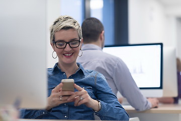 Image showing startup business, woman  working on desktop computer