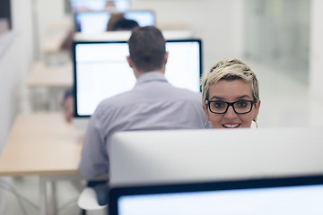 Image showing startup business, woman  working on desktop computer