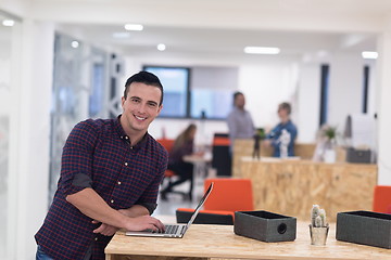 Image showing startup business, young  man portrait at modern office