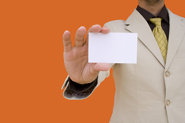 Image showing Businessman showing his card