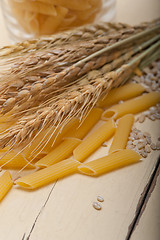 Image showing Italian pasta penne with wheat