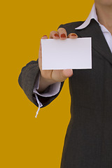 Image showing businesswoman holding a card 1