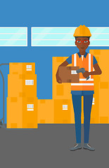 Image showing Worker checking barcode on box.