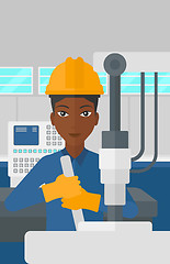 Image showing Woman working with industrial equipment.