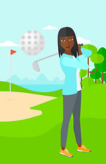 Image showing Golf player hitting the ball.