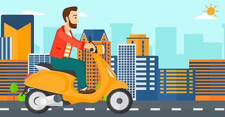 Image showing Man riding scooter.