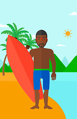 Image showing Surfer holding surfboard.