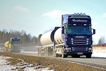 Image showing Two Scania Tank Trucks Platoon along Spring Highway
