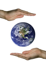 Image showing Holding the blue earth