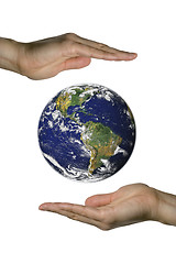 Image showing Holding the blue earth