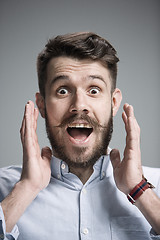 Image showing Portrait of young man with shocked facial expression