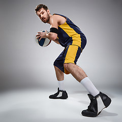 Image showing Full length portrait of a basketball player with ball 