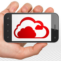 Image showing Cloud computing concept: Hand Holding Smartphone with Cloud on display