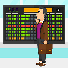 Image showing Man looking at schedule board.