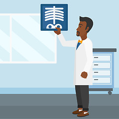 Image showing Doctor examining radiograph.