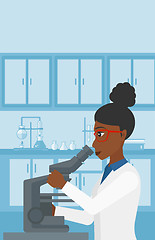 Image showing Laboratory assistant with microscope.