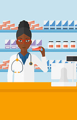 Image showing Pharmacist showing some medicine.