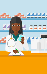 Image showing Pharmacist taking notes.