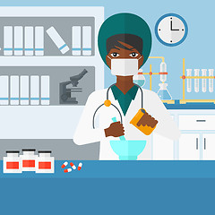 Image showing Pharmacist preparing medicine.