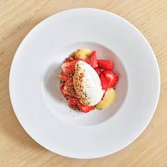 Image showing Gourmet dessert with strawberries and ice cream