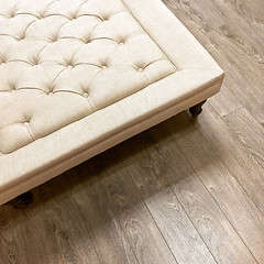 Image showing Fancy ottoman on wooden floor