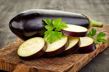 Image showing sliced eggplant on cutting board