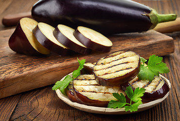 Image showing grilled eggplant on wooden table