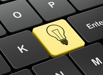 Image showing Finance concept: Light Bulb on computer keyboard background