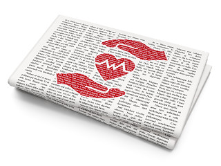 Image showing Insurance concept: Heart And Palm on Newspaper background