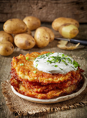 Image showing Potato pancakes on wooden table