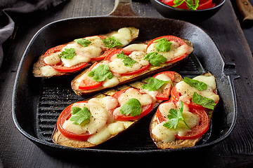 Image showing Baked eggplant with tomatoes and cheese