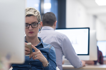 Image showing startup business, woman  working on desktop computer