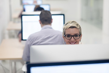 Image showing startup business, woman  working on desktop computer