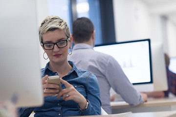 Image showing startup business, woman  working on desktop computer