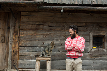 Image showing portrait of man and cat