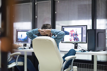 Image showing photo editor at his desk