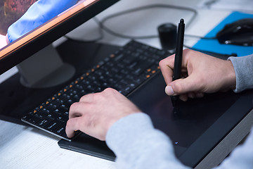 Image showing photo editor at his desk